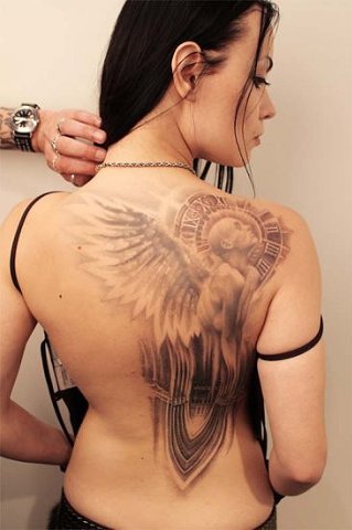 Фото и значение татуировки Ангел ( несут функцию защиты своего владельца ) X_4fd37f6b